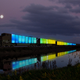 Illustration for article titled This Glowing Train Is Bringing Art, Music, and Yurts to Middle America